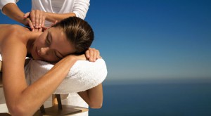 Young Woman Receiving Back Massage
